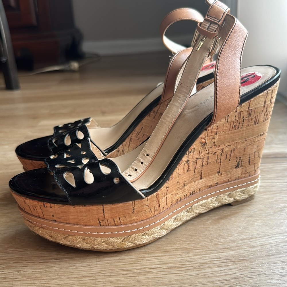 Woman’s Nine West Black and Tan Wedge Sandals Size 6